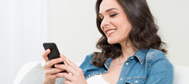 happy woman using phone